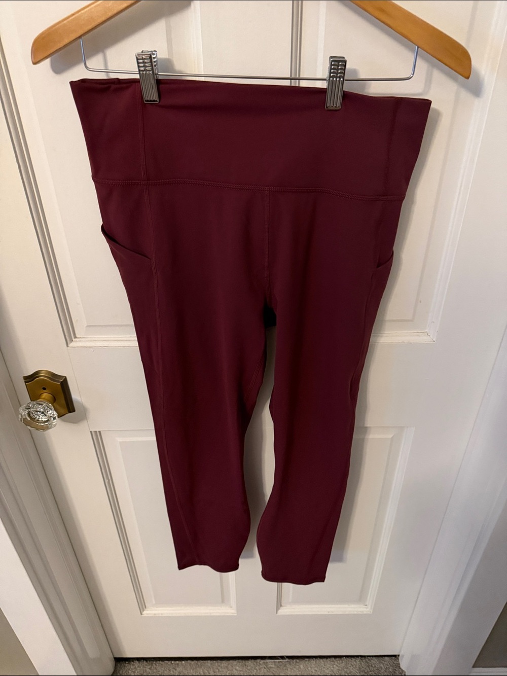Fabletics PureLuxe High-Waist Burgundy Capri Leggings with Side Pockets